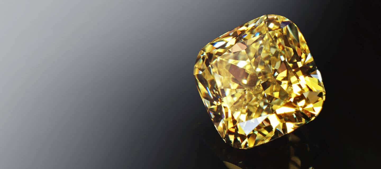 Yellow square diamond on dark gradient background