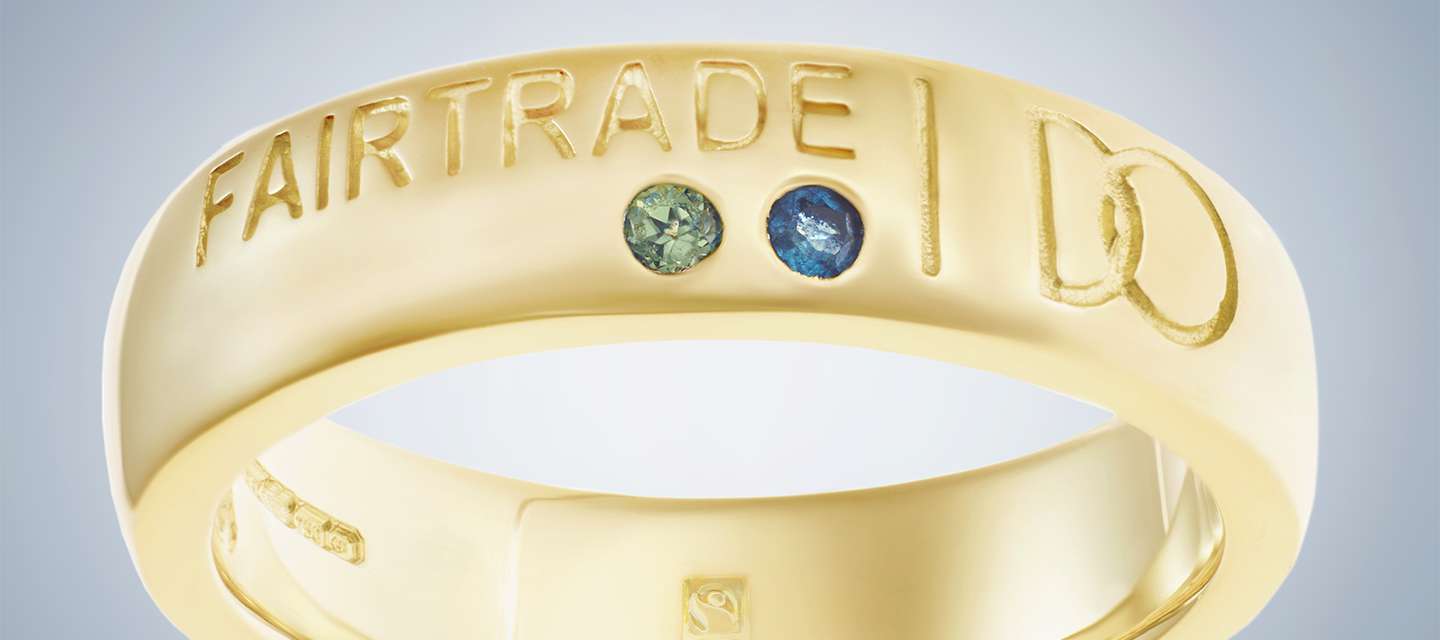 Wedding ring engraved with, "Fairtrade, I do"