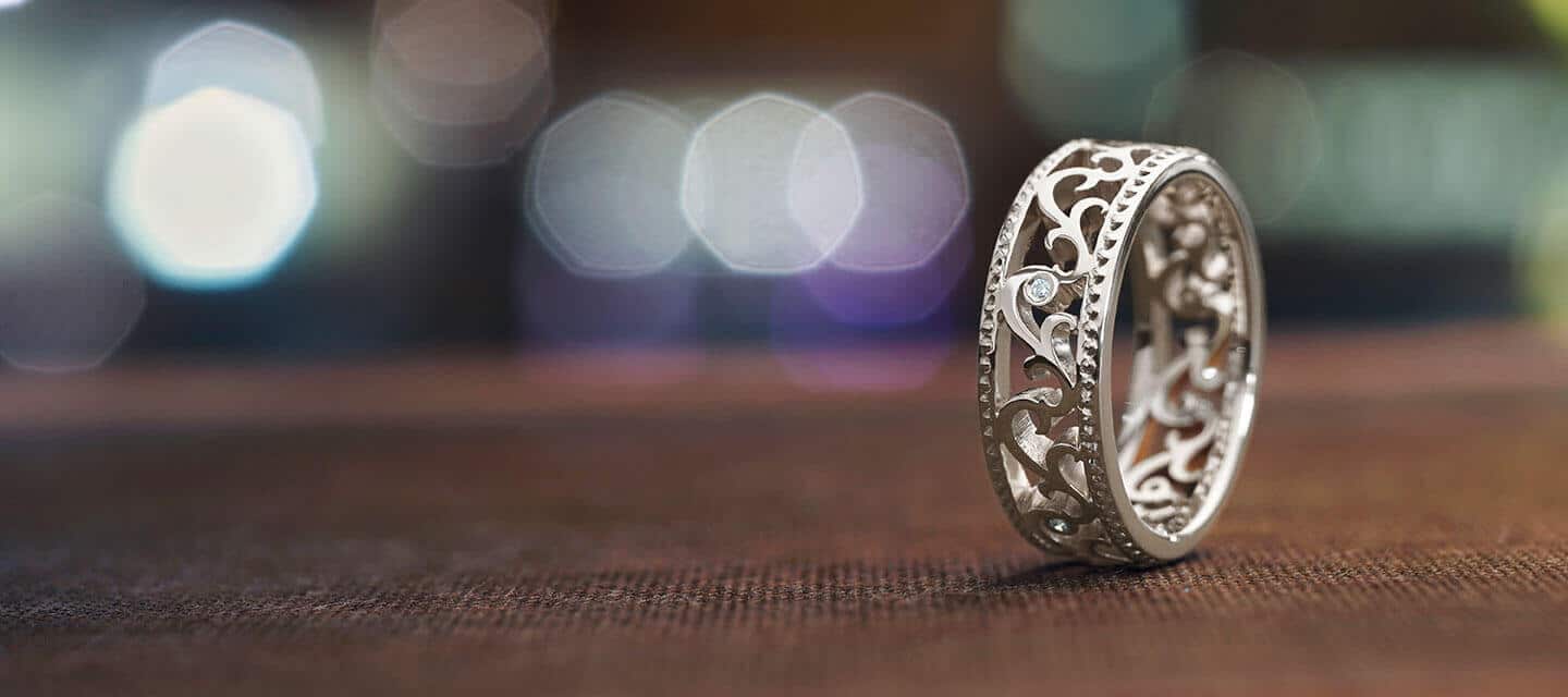 floral diamond ring on wooden table