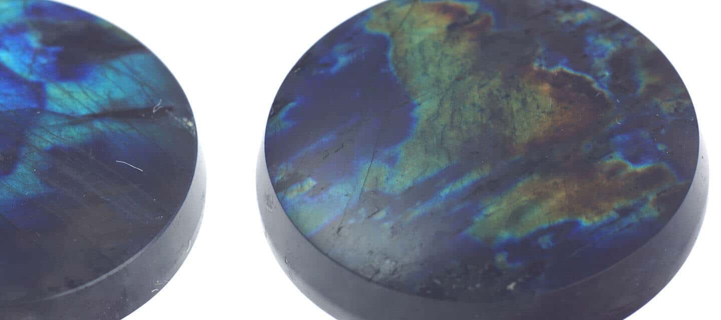 Close up of 2 multicoloured labradorite