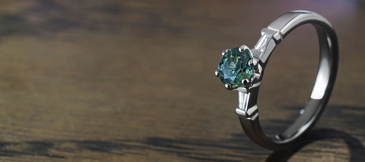 Green sapphire engagement ring