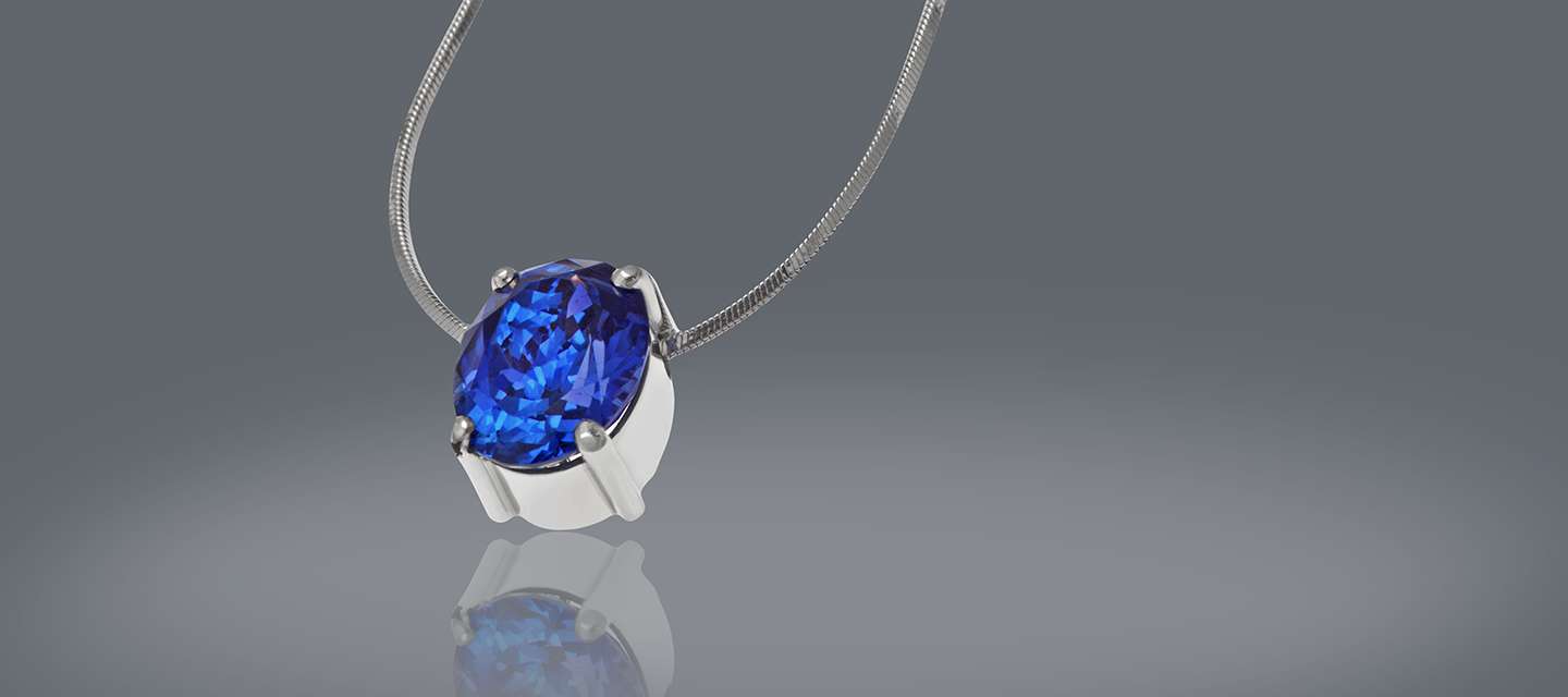 Blue sapphire pendant in white metal