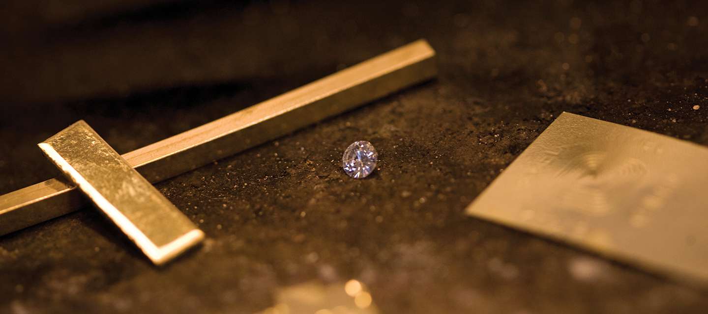 Sheets of gold and diamond on workbench