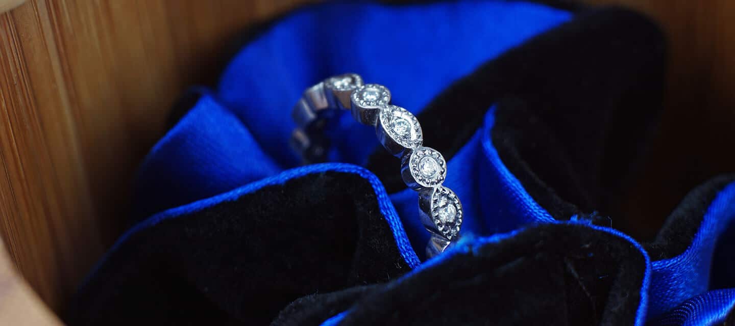 Diamond eternity ring in blue velvet