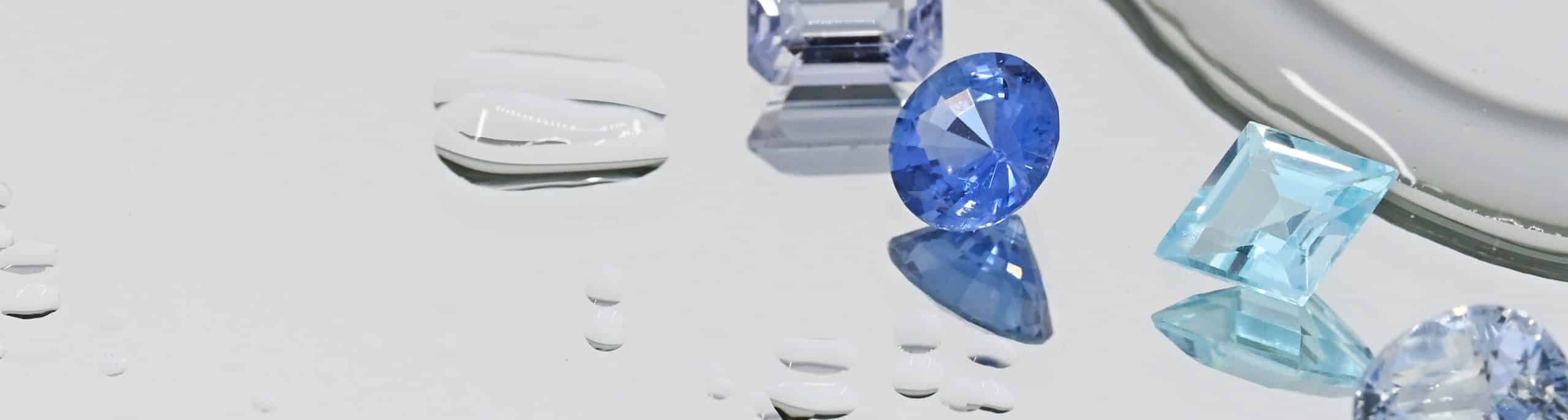 blue gemstones with water droplets