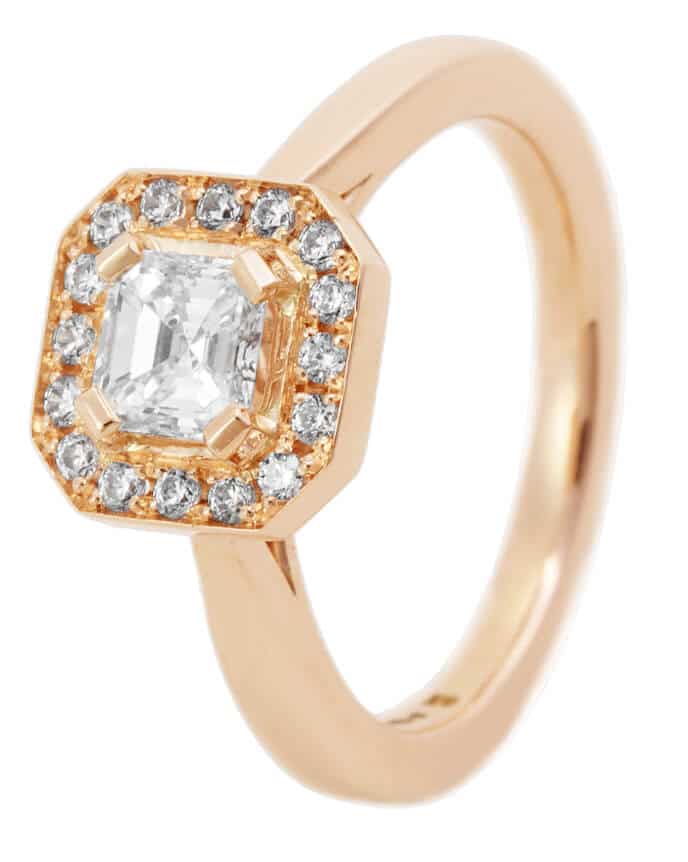 asscher cut diamond halo in gold ring