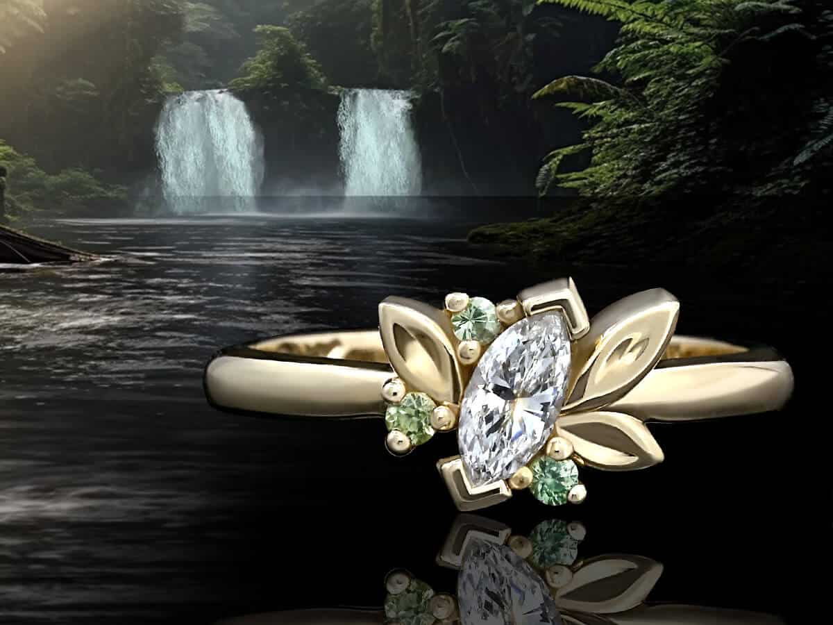 leave shaped green sapphire and marquise diamond ring over waterfall