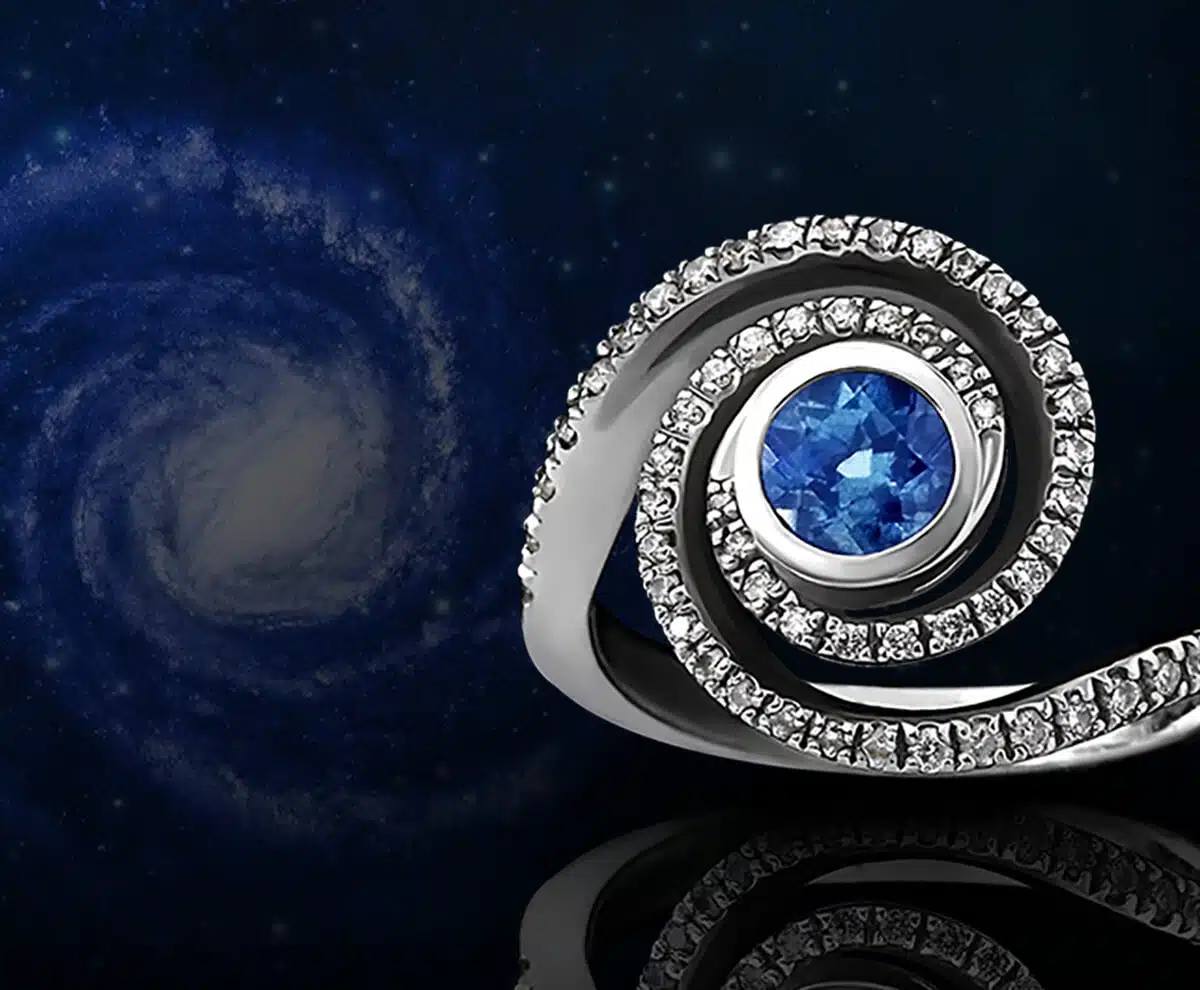 Unusual sapphire and diamond galaxy swirl ring