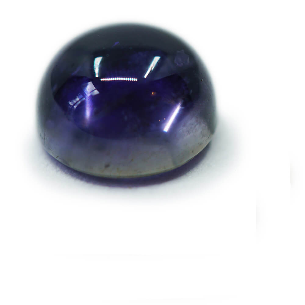 dark blue round cabochon iolite