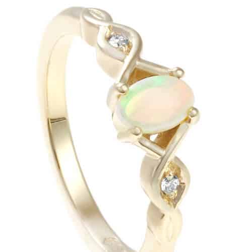 Celtic twist shaped opal and diamond gold ring