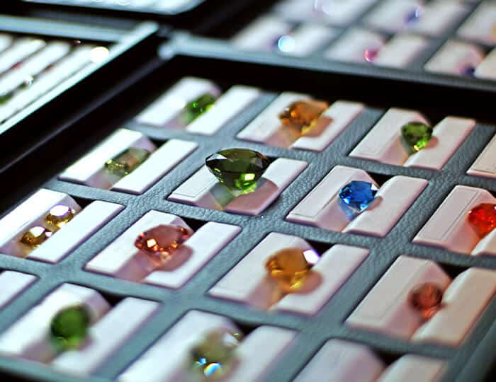 Tray of colourful gemstones