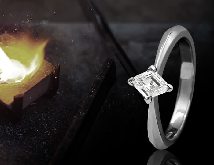 Diamond and platinum kite shaped ring with flame