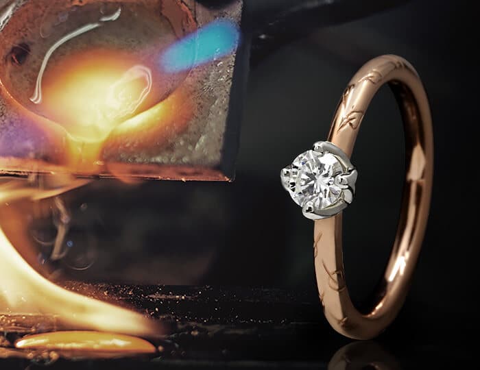 engraved gold ring with pouring fire