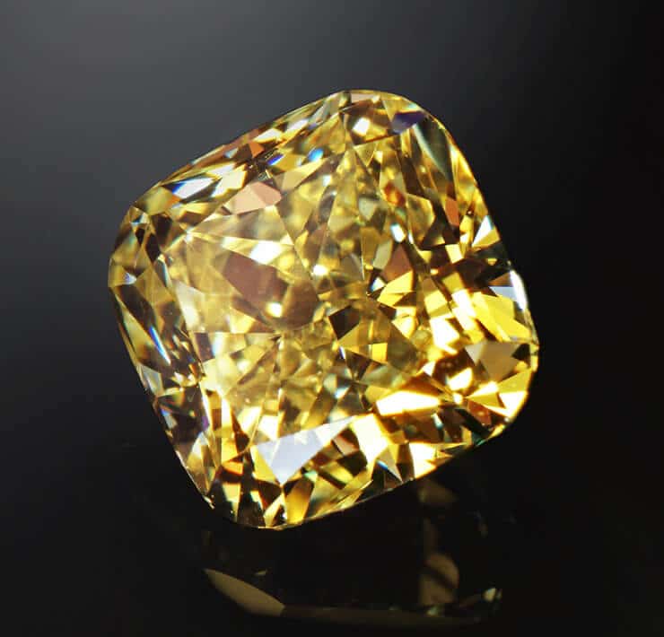 fancy yellow cushion cut facetted diamond