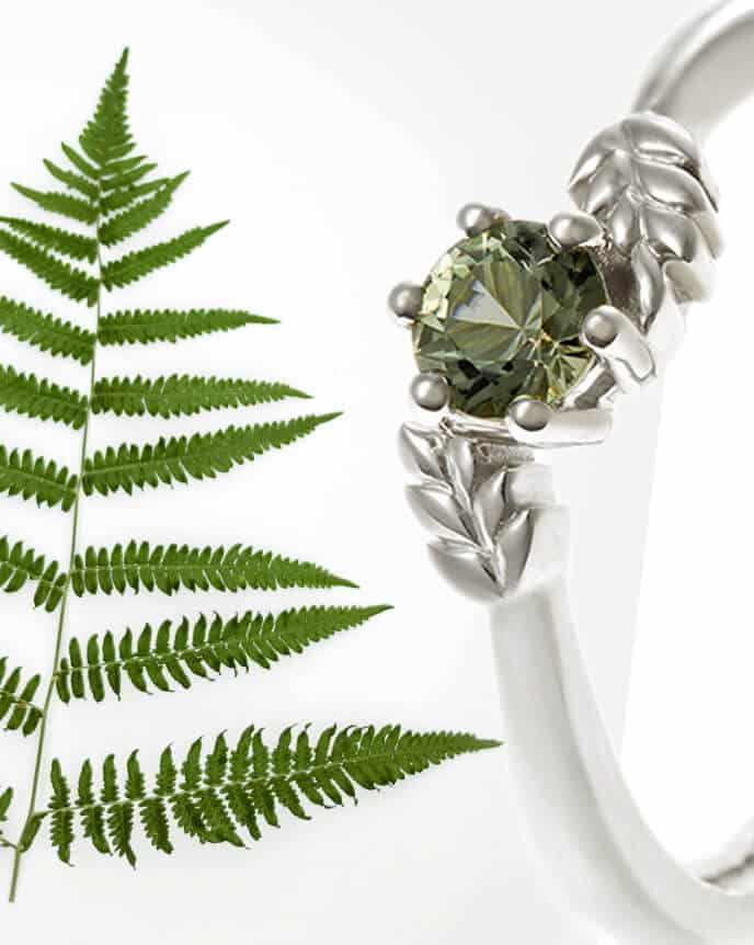 Fern shaped tourmaline engagement ring with fern leaf