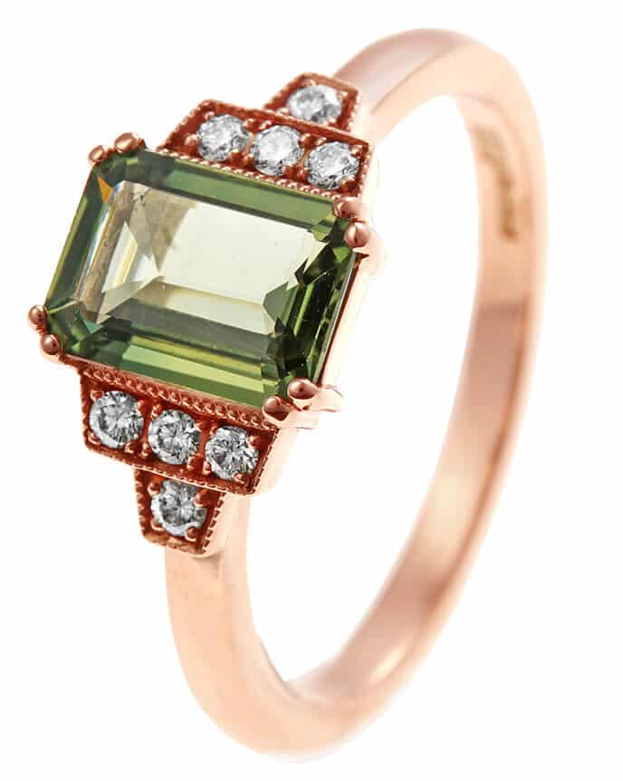 green sapphire emerald cut and rose gold ring