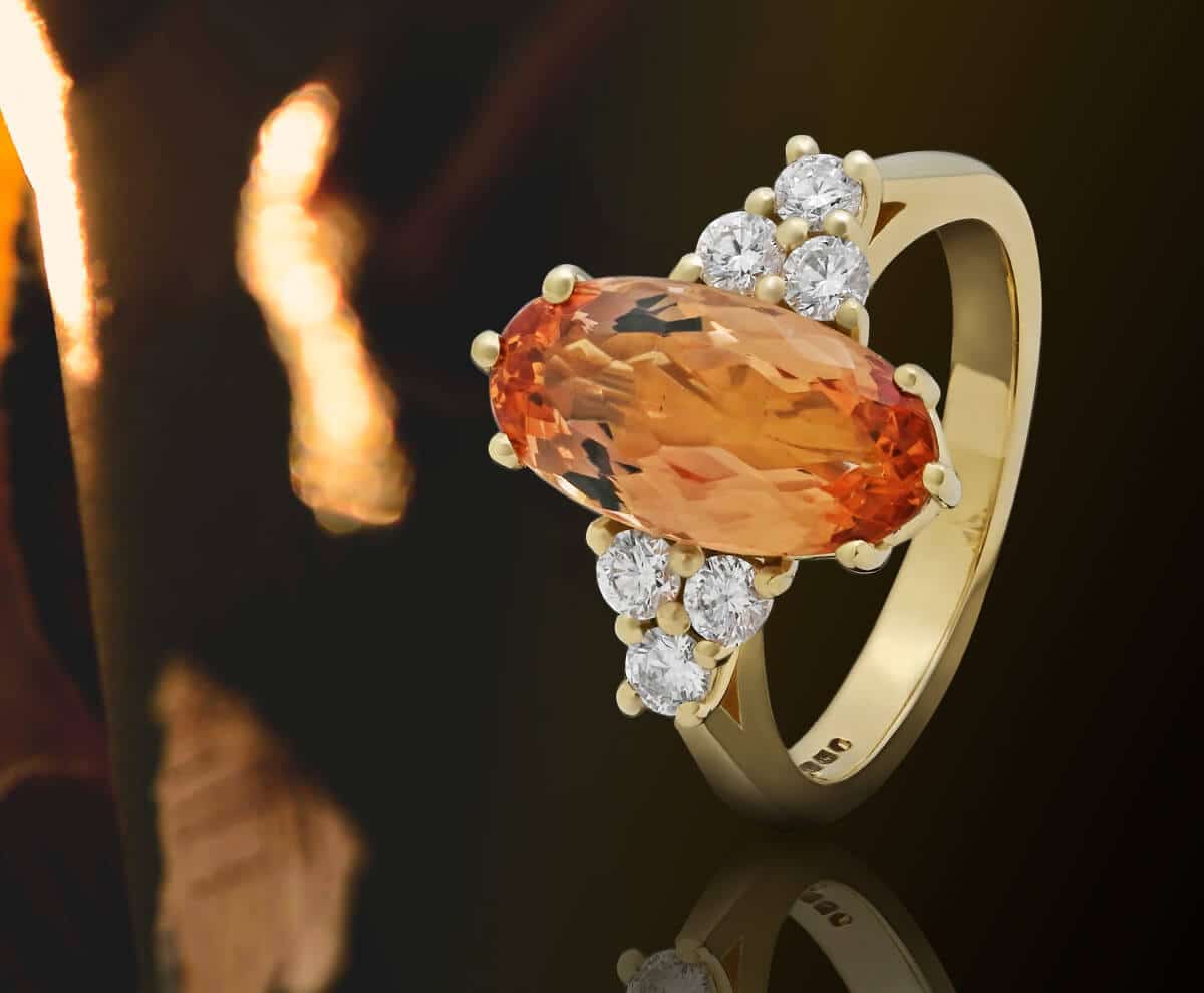 Long oval orange topaz gold ring with orange leaves