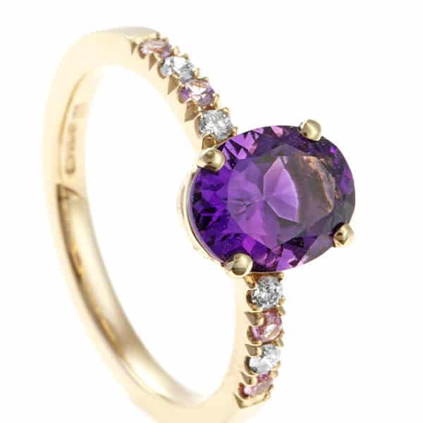 deep purple amethyst in gold ring