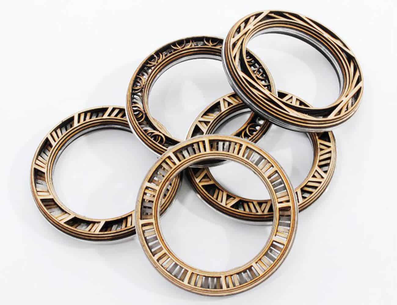 set of five wooden sculpture rings