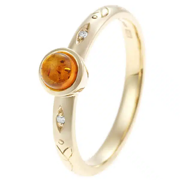 leaf engraved engagement ring with amber and diamonds