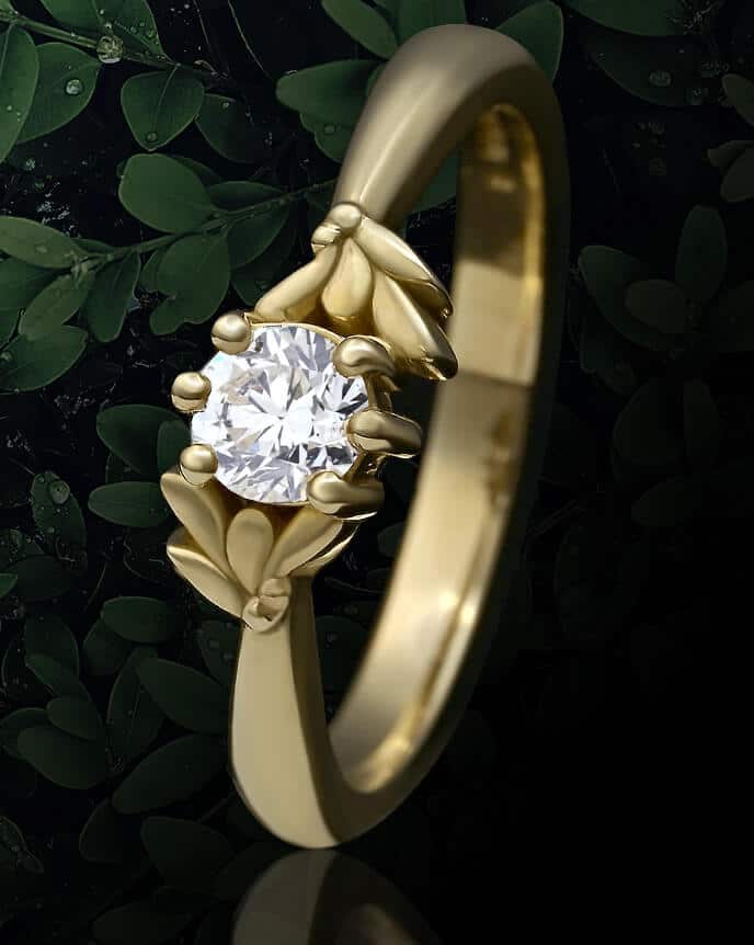 foliage with leaf shaped diamond ring in front