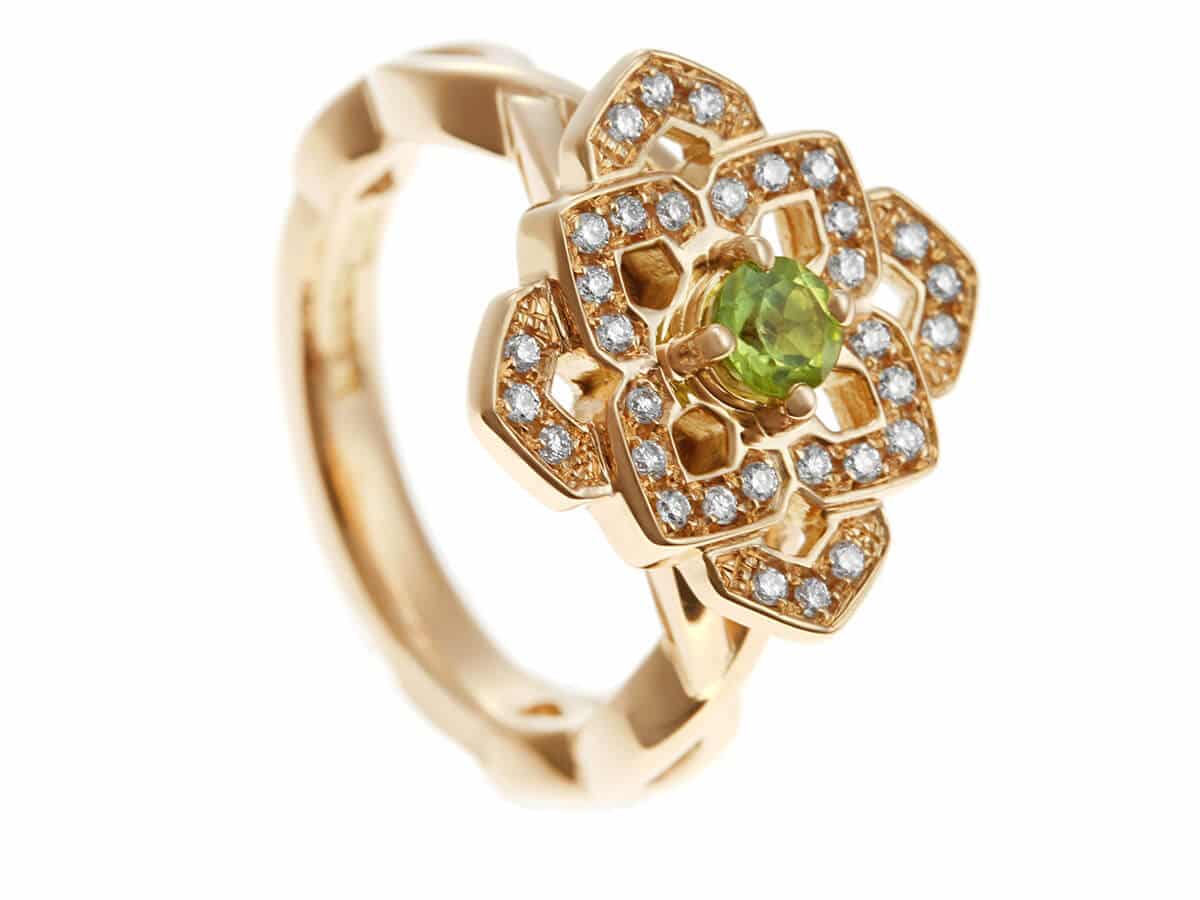 yellow gold and pale green dramatic ring design