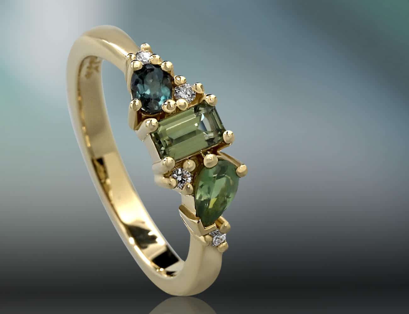 mix cut green gemstone and gold ring