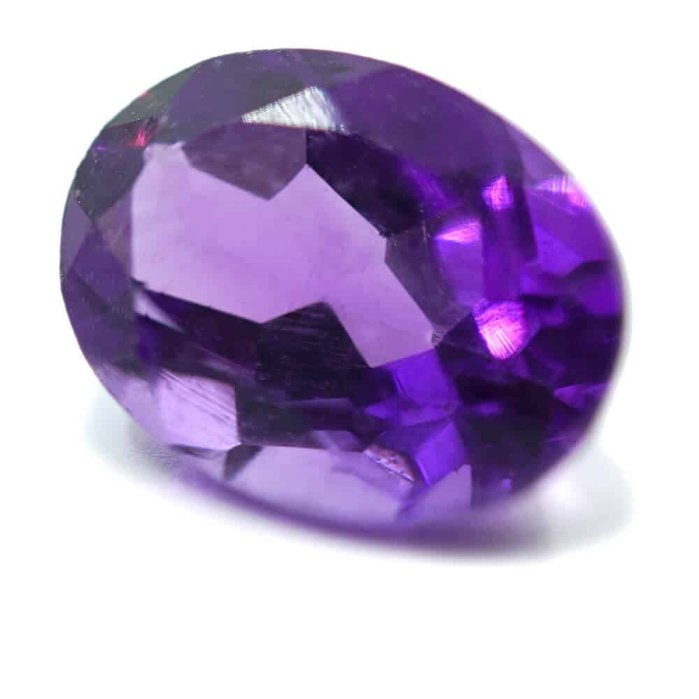 oval cut deep purple amethyst gemstone