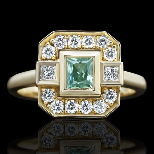 green sapphire halo designed engagement ring