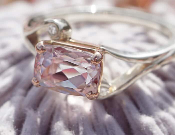 Emerald cut morganite engagement ring on flower