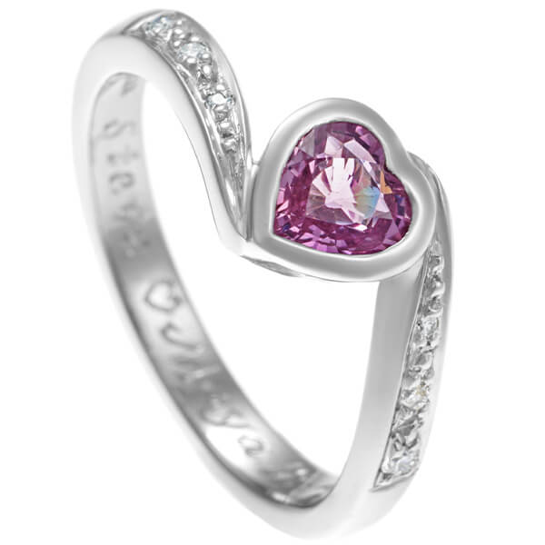 engraved ring with pink sapphire heart