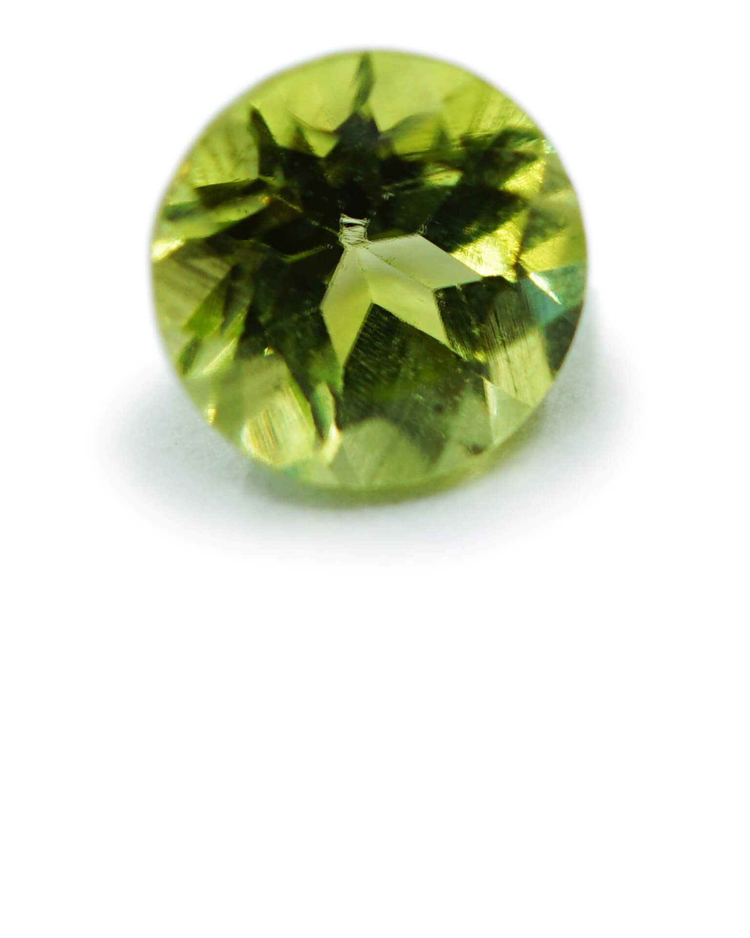 round cut facetted green peridot