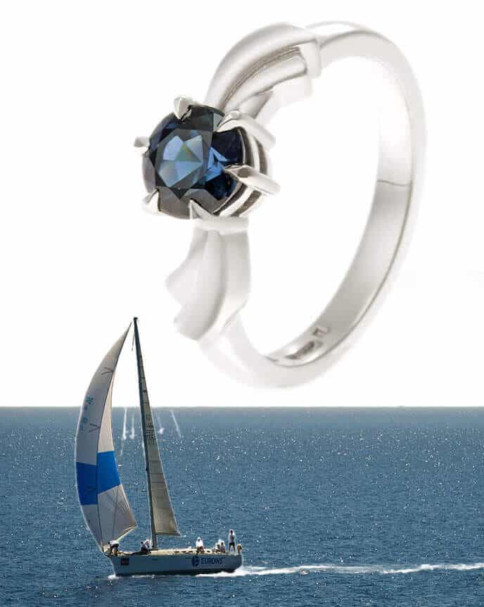 sailing inspired engagement ring design with sail boat