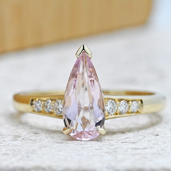 long pink morganite in diamond and gold ring