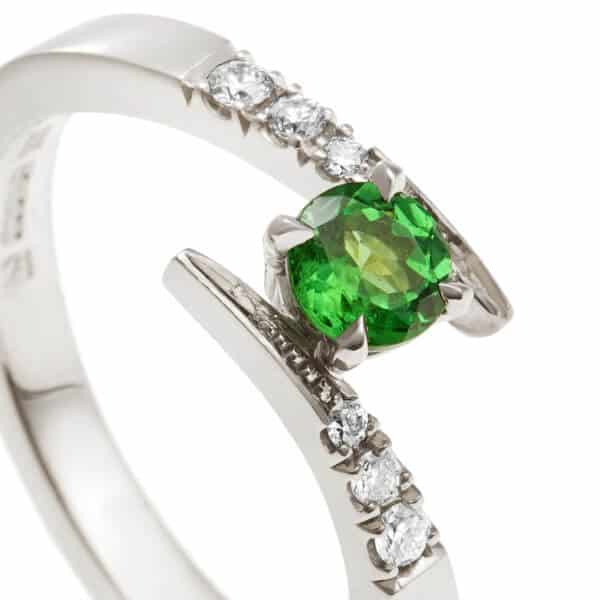 modern twist tsavorite and diamond engagement ring