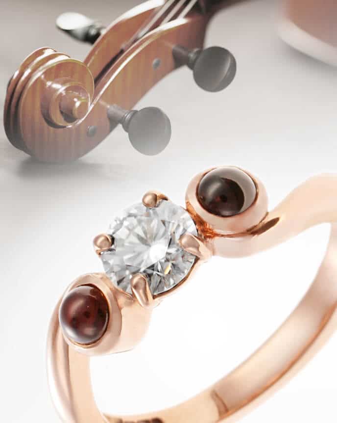 violin scroll shaped diamond and garnet ring with violin