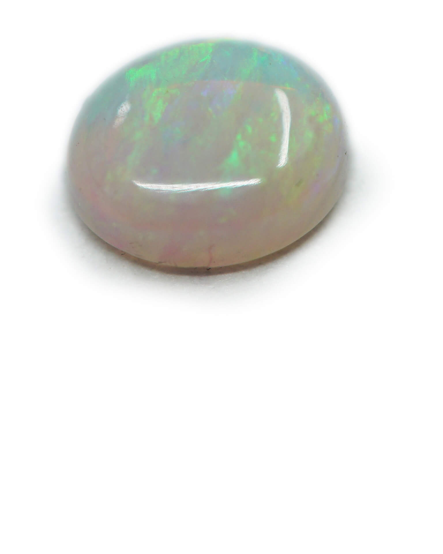 white round cabochon opal