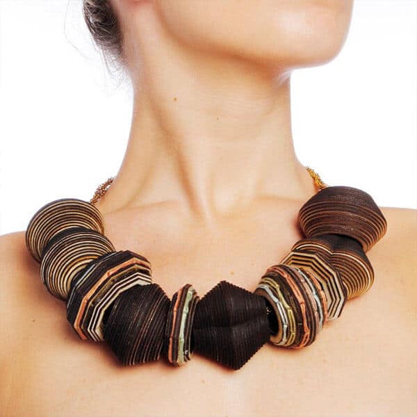 large strung wooden necklace on model