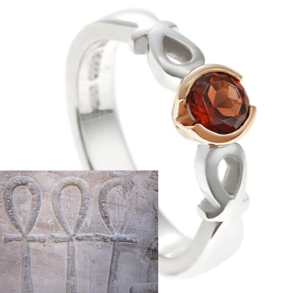 ankh shaped garnet eternity ring with egyptian relief