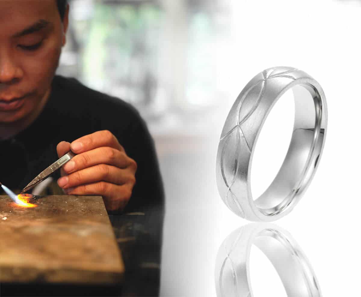 platinum wedding ring with engraving and goldsmith