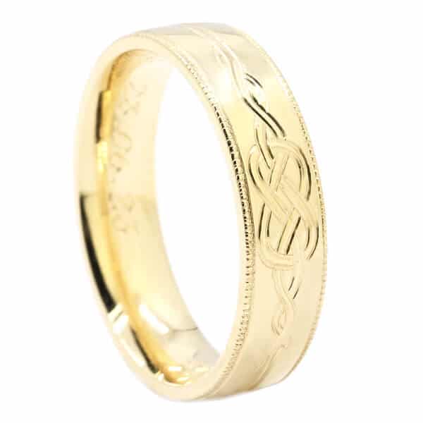 Gold Celtic knot hand engraved wedding ring