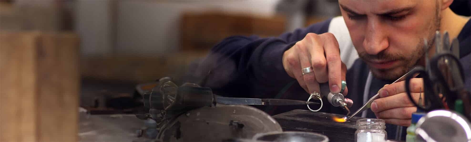 Goldsmith handmaking a ring