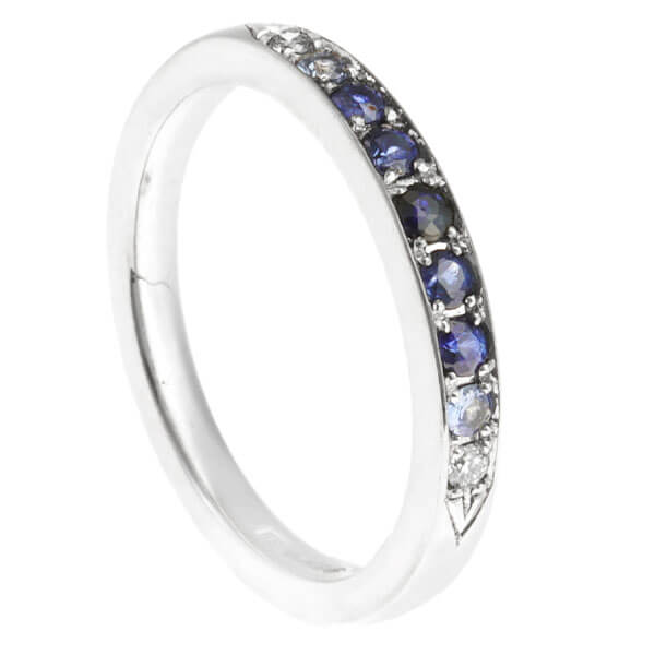 narrow graduating blue sapphire eternity ring