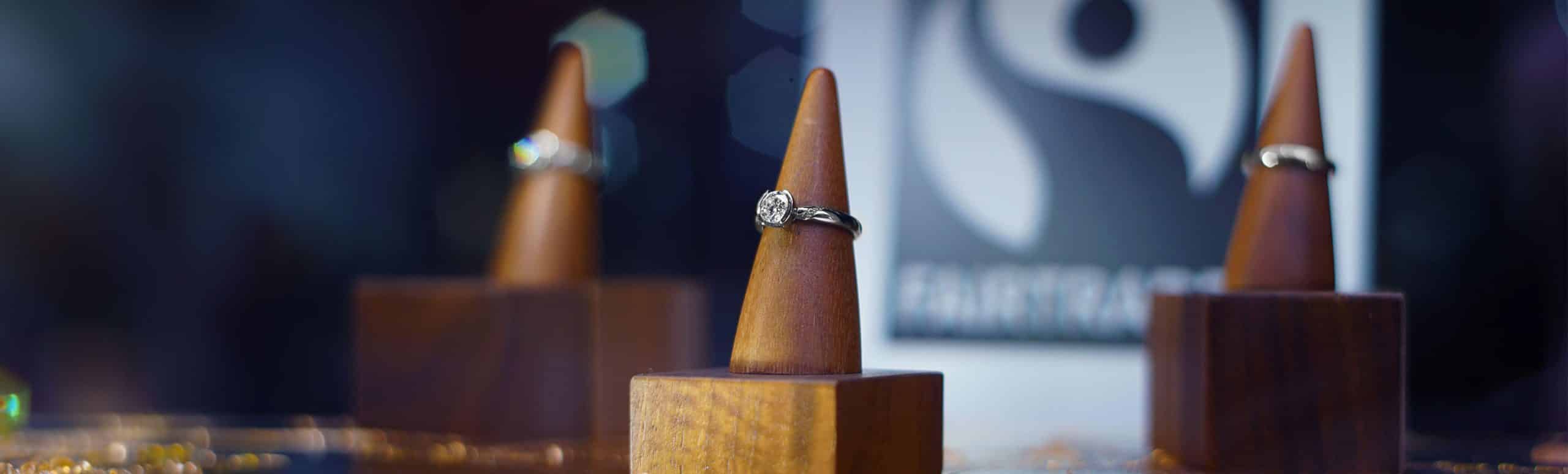 jewellery display on wooden cones with Fairtrade logo