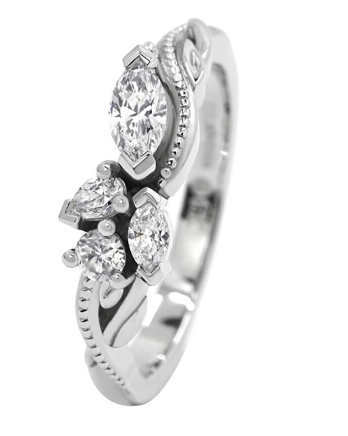 randomly set marquise and pear cut diamond ring