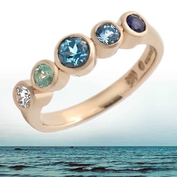 ocean turquoise sapphire five stone ring with ocean