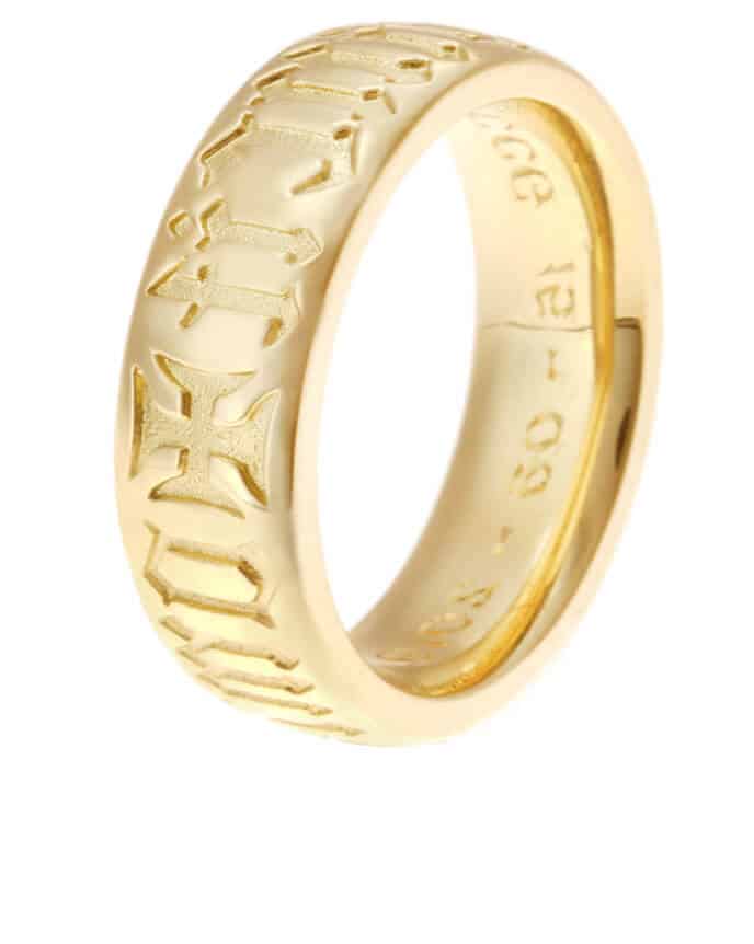 wide engraved gold wedding ring with lettering