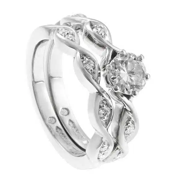 rippled wedding and engagement ring set with diamonds