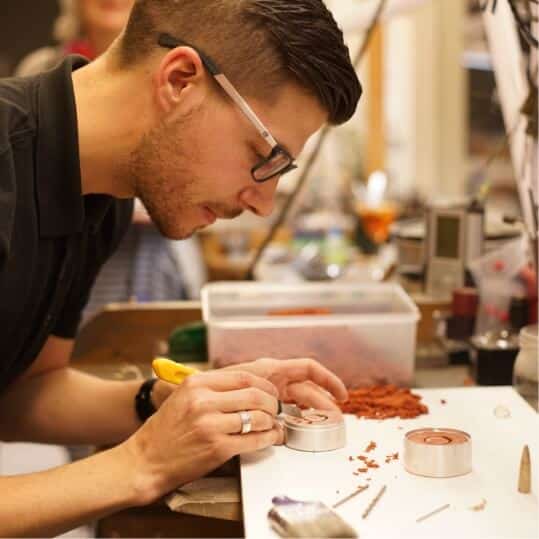 Goldsmith working a bench