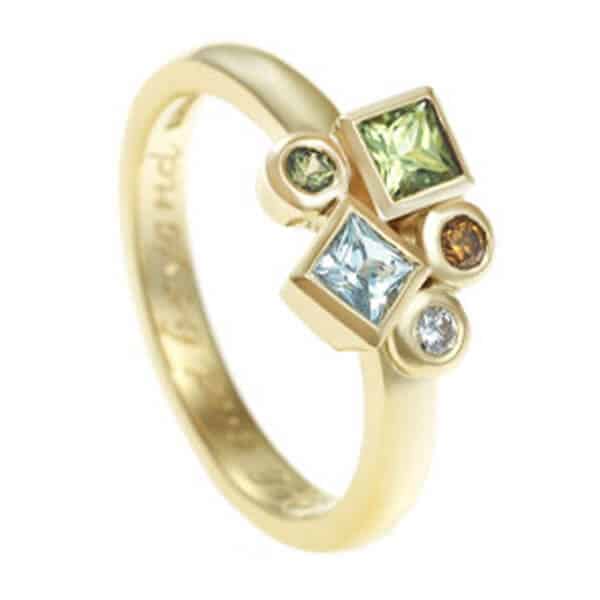 modern yellow gold ring with square coloured gemstones